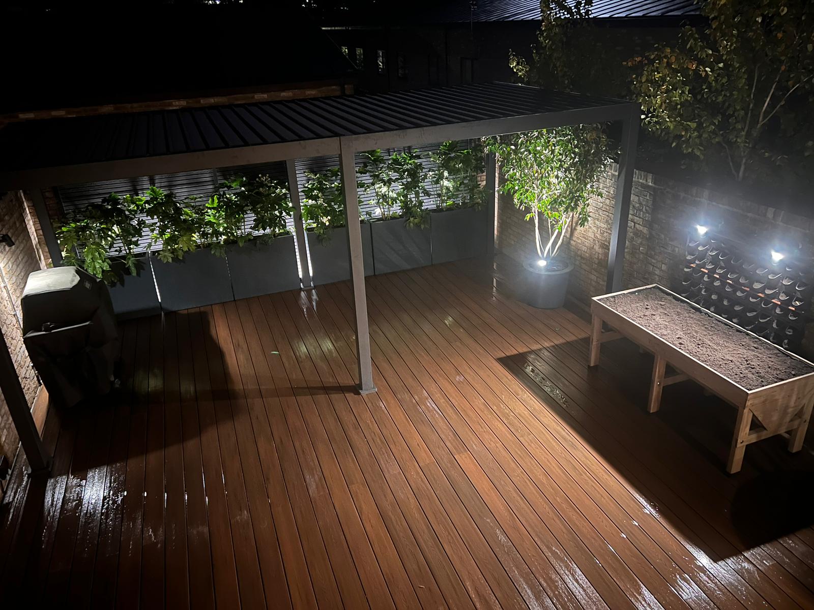Completed Rowan Gardens deck and pergola garden photographed at night